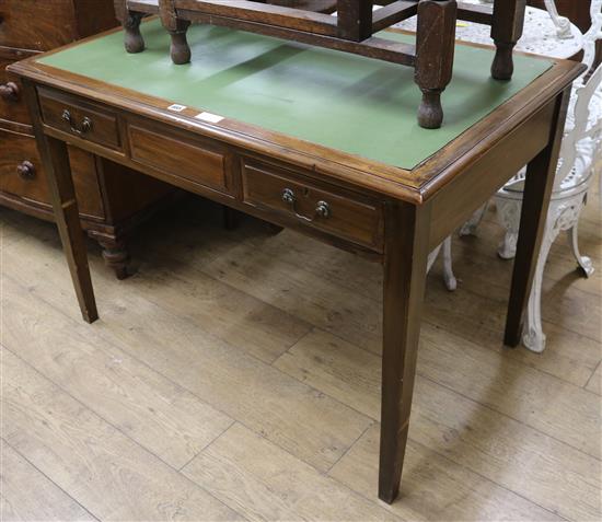 A mahogany leather top writing table W.107cm